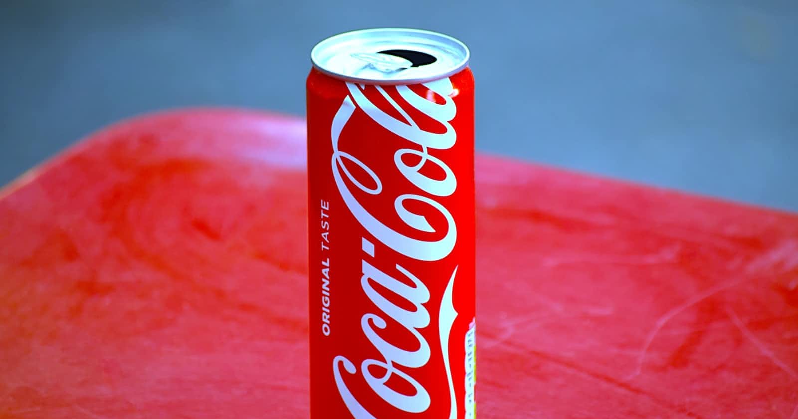 How does Coca-Cola use AI to create its latest beverage