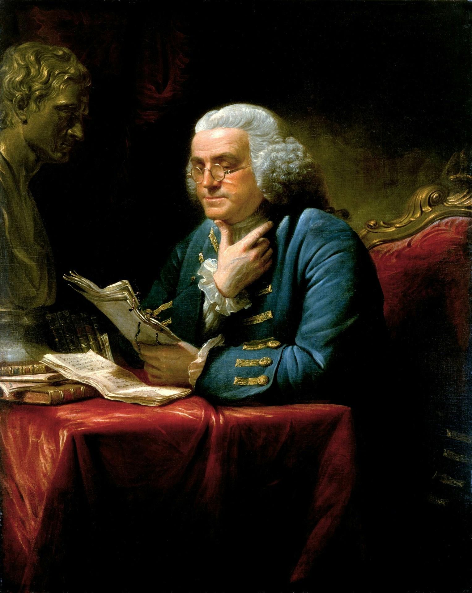 Benjamin Franklin said “The person who deserves most pity is a lonesome one on a rainy day who doesn’t know how to read.” This is a painting of him *in London, with the bust of Isaac Newton on his desk. **It captures the spirit of reading at its best.***