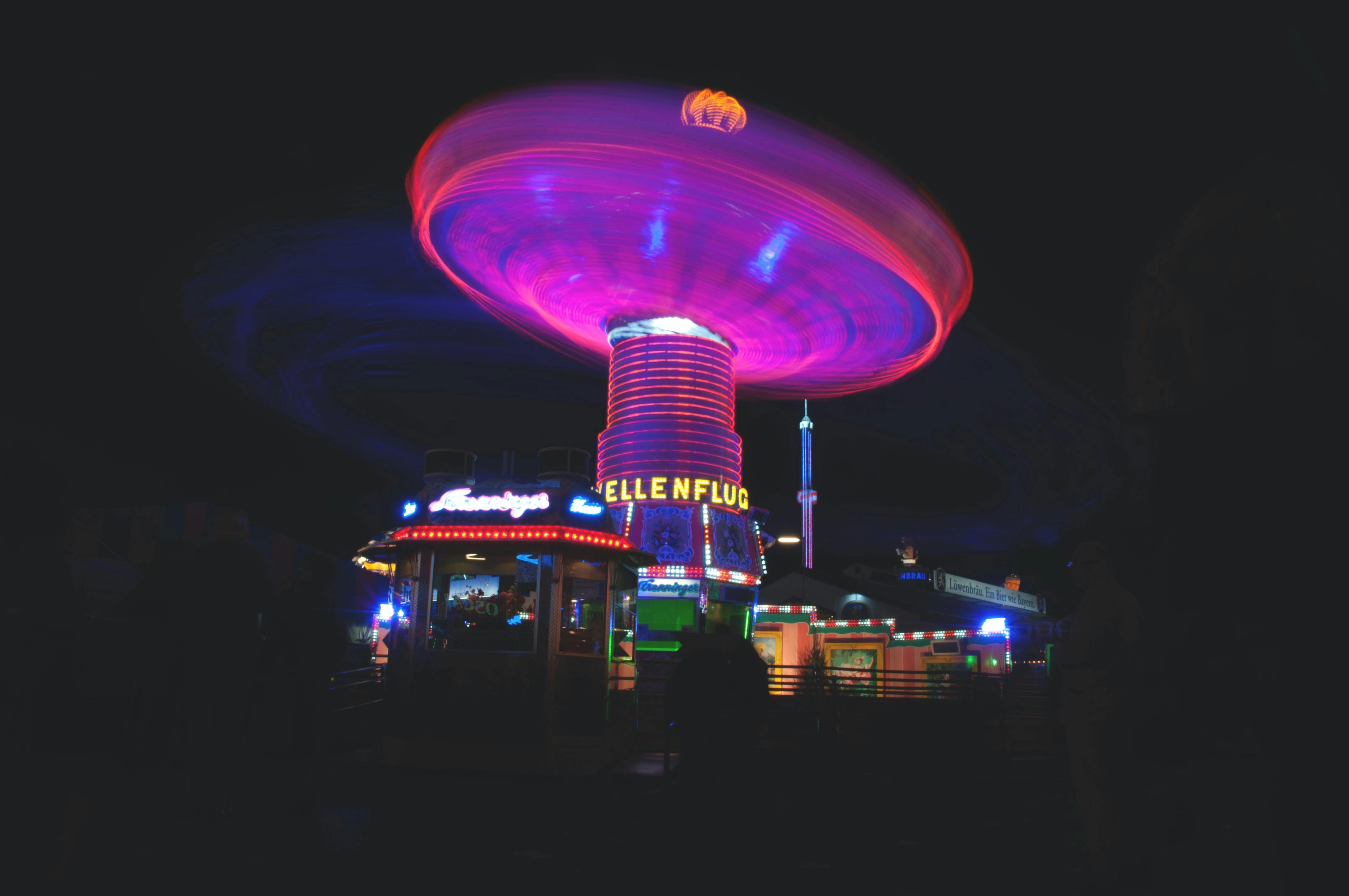 photo of amusement ride at oktoberfest during the nighttime hours