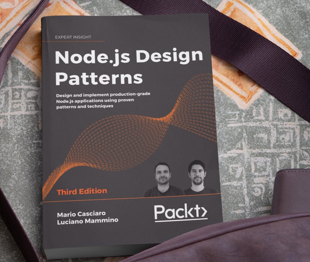 Node.js Design Patterns, the book on a table