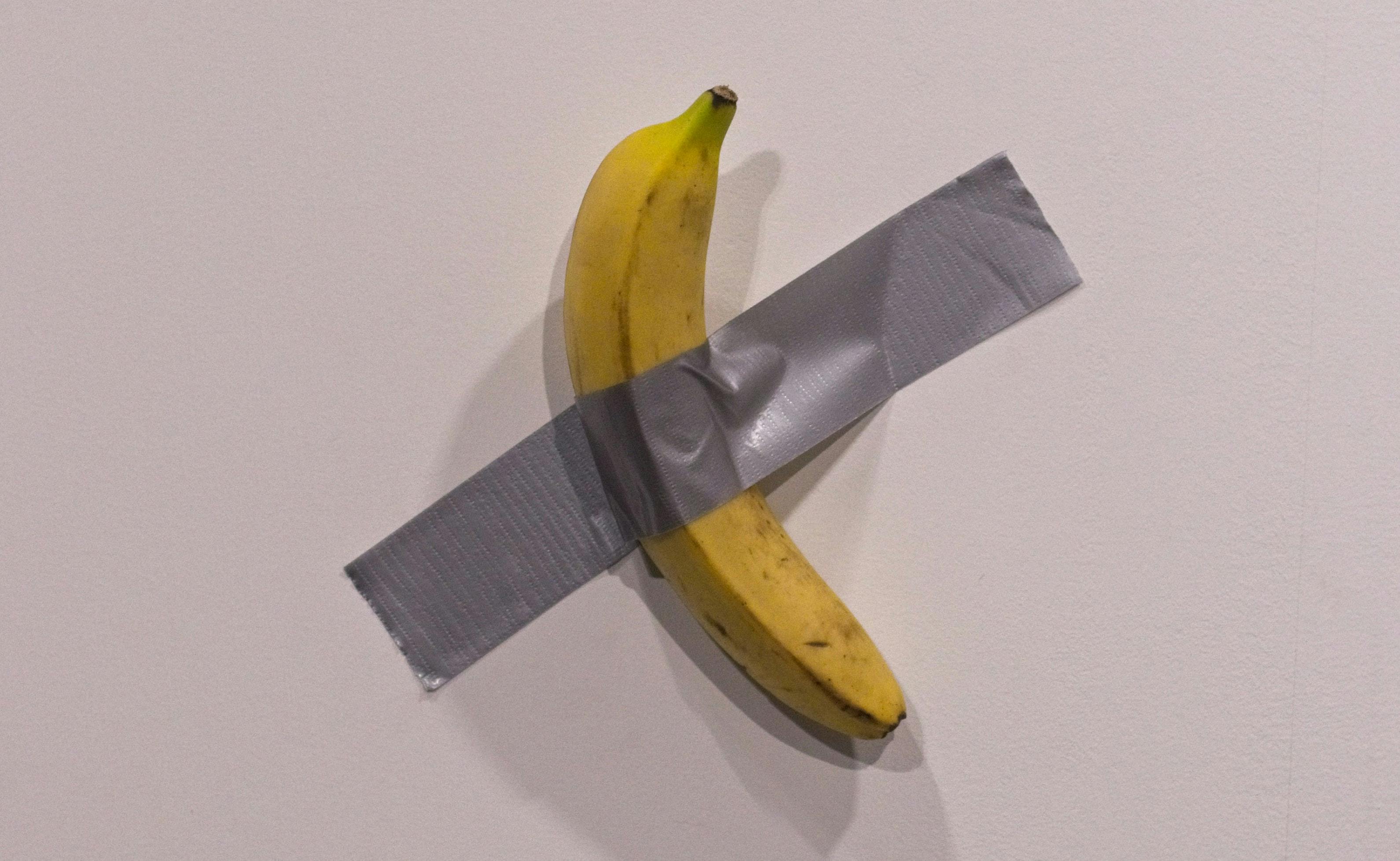 Banana duck-taped to wall