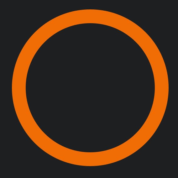An orange circle on a dark background