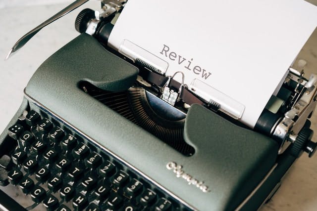 A close up of an old fashioned typewriter.