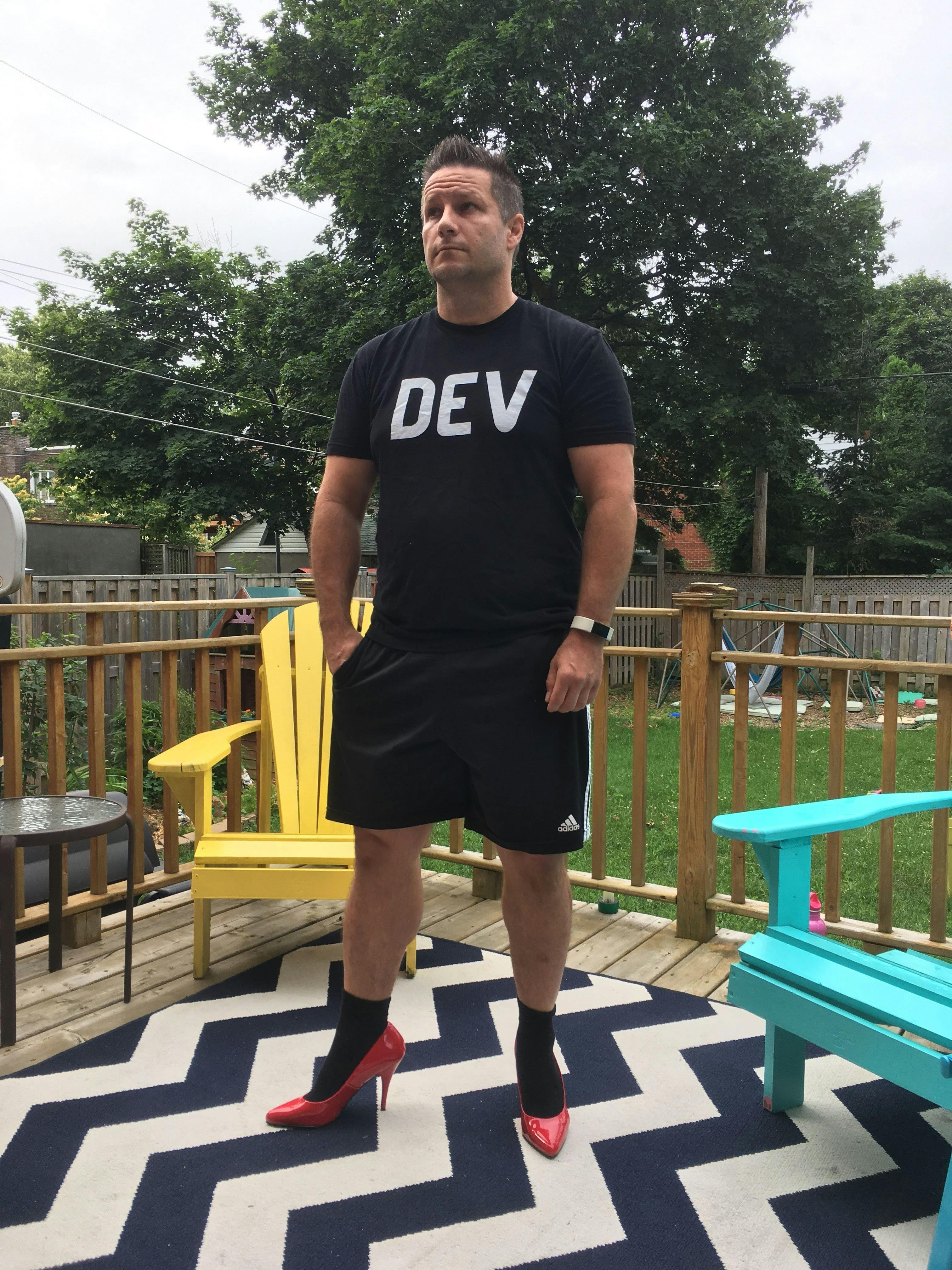 Me on my deck in high heel shoes after doing the Walk a Mile in Her Shoes fundraiser