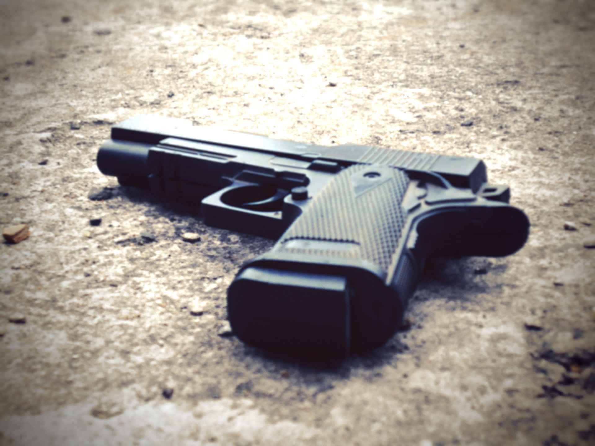 gun-on-ground_public-domain-photo.jpg