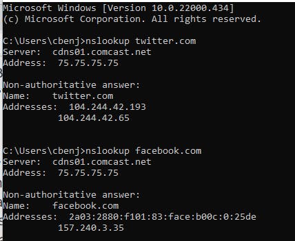 windows command prompt showing the command line version of nslookup and resolving twitter.com and facebook.com