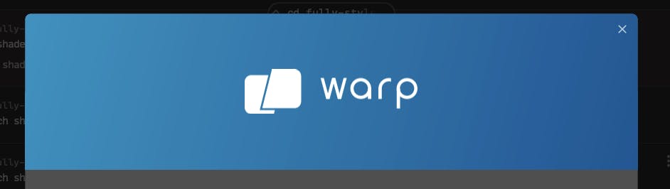 A header in Warp's UI with a linear gradient