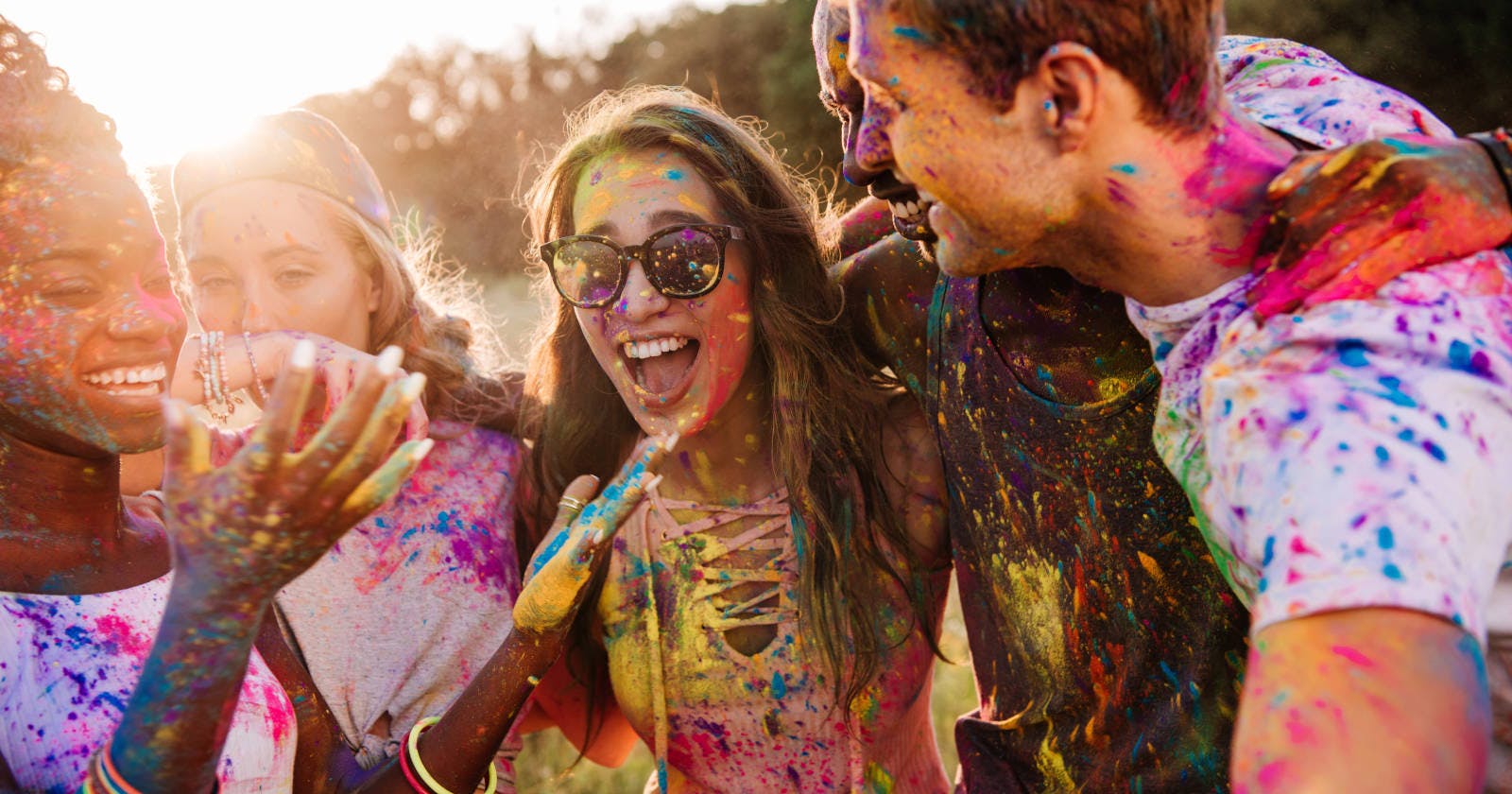 International People Pour Colourful Powder on Each Other Celebrating Holi Spring Colours and Love. jpg