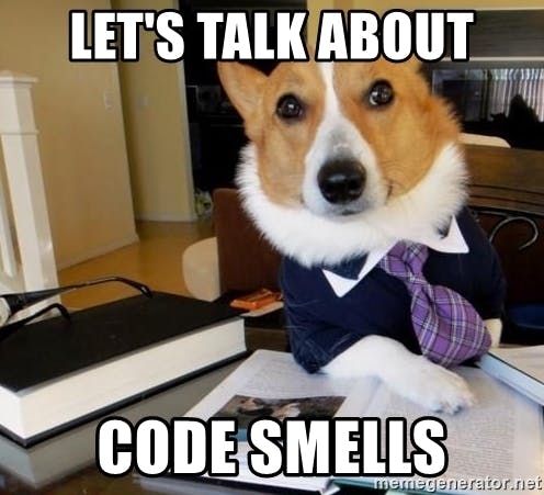lDog lawyer (corgi in a suit at a desk) captioned Let's talk about code smells