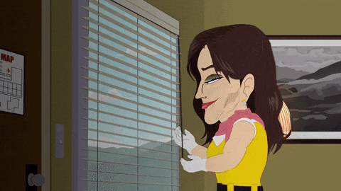 South Park version of Caitlyn Jenner closing the blinds with a mischievous smile