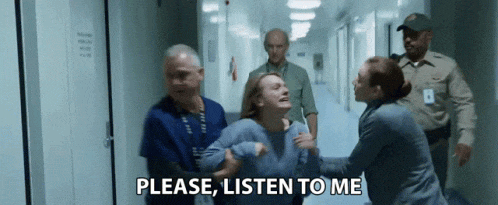 Elizabeth Moss being dragged away with caption: "Please listen to me"
