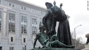 Statue of a Colonizer & Christian Subduing Native American