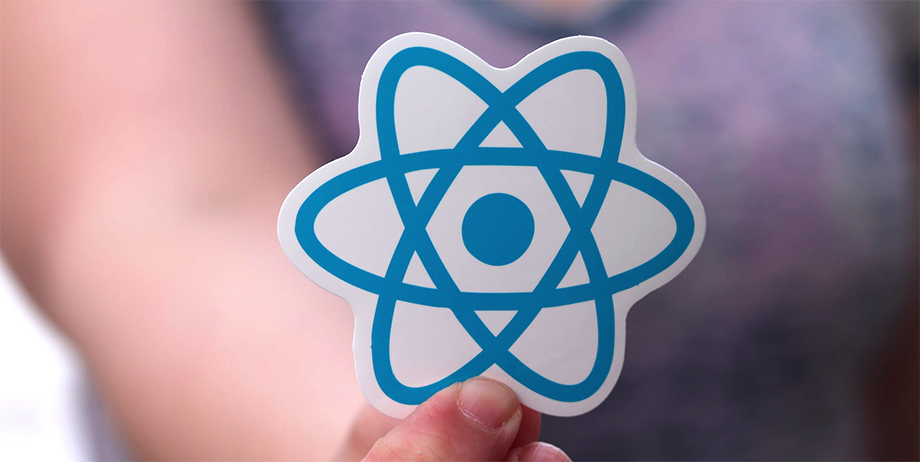 Person holding react sticker