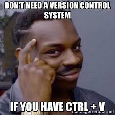 Black man tapping the side of his head to indicate a smart idea captioned "Don't need a version control system if you have ctrl + v"