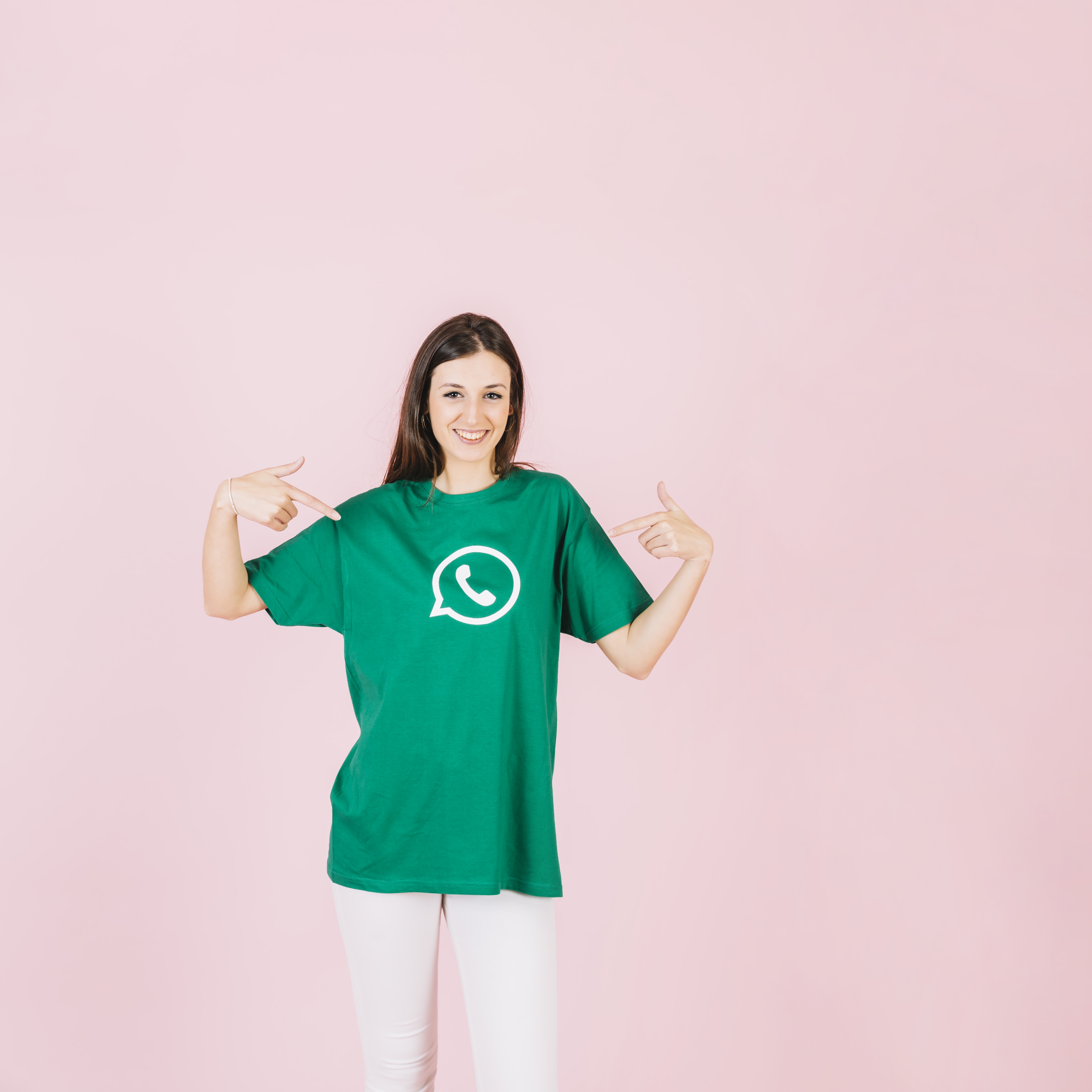 portrait-smiling-woman-pointing-her-t-shirt-with-whatsapp-icon.jpg