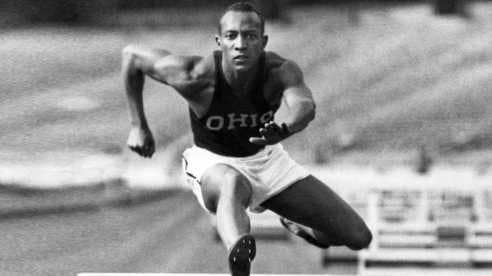 Jesse Owens Jumping Hurdles