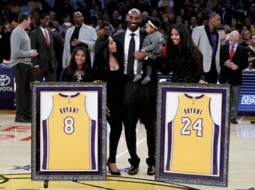 Kobe Bryant With Family & Retired Jerseys