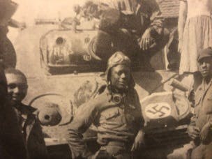 HANDOUT - James Baldwin, center, fought in World War II, helping to liberate the Netherlands. His job in the Army battalion was to give the orders from the tank. They used an 81 MM mortar gun that fires long range.  We came in and freed them, Baldwin said. We liberated them. We ran the Germans out. We took 23 cities in three days. We were moving fast. Thats called liberation. He received a certificate of appreciation and gifts from the embassy of the Netherlands February 6, 2020. Baldwin, 95, served in the 784th Tank Battalion during the war. (Family photo)