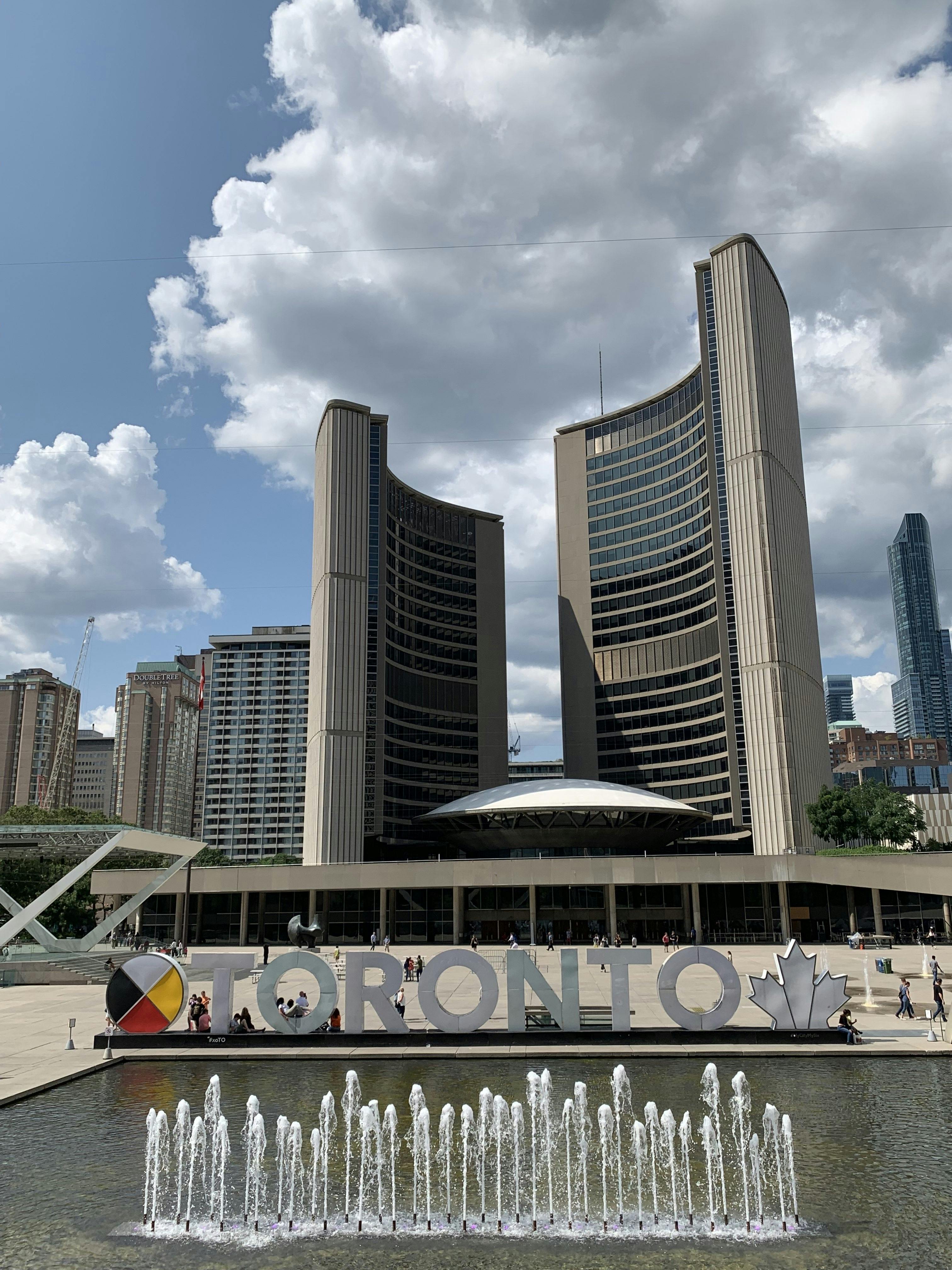 A glimpse of Nathan Phillips Square and Toronto City Hall