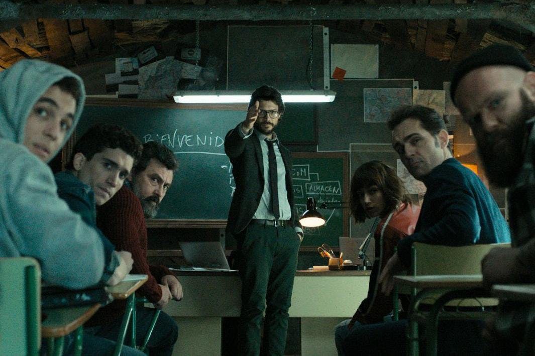 A Meme from Money Heist showing the casts in a classroom