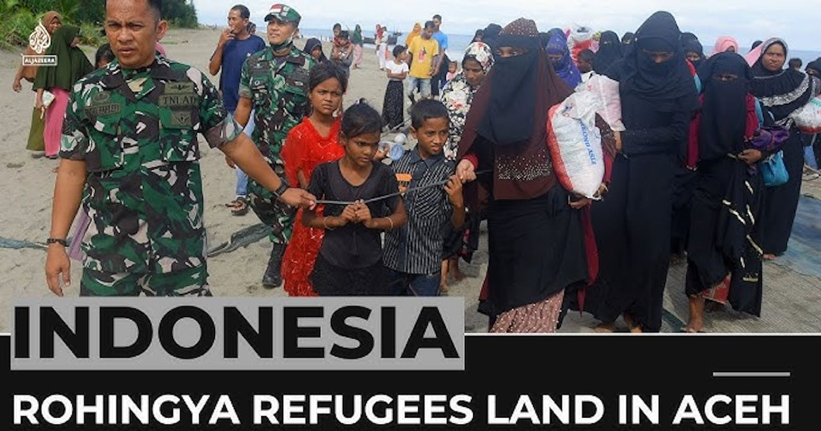Anti-Rohingya protesters storm Indonesia refugee shelter demanding deportation