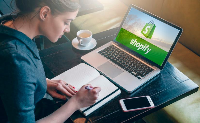A girl is working on Shopify an online store.