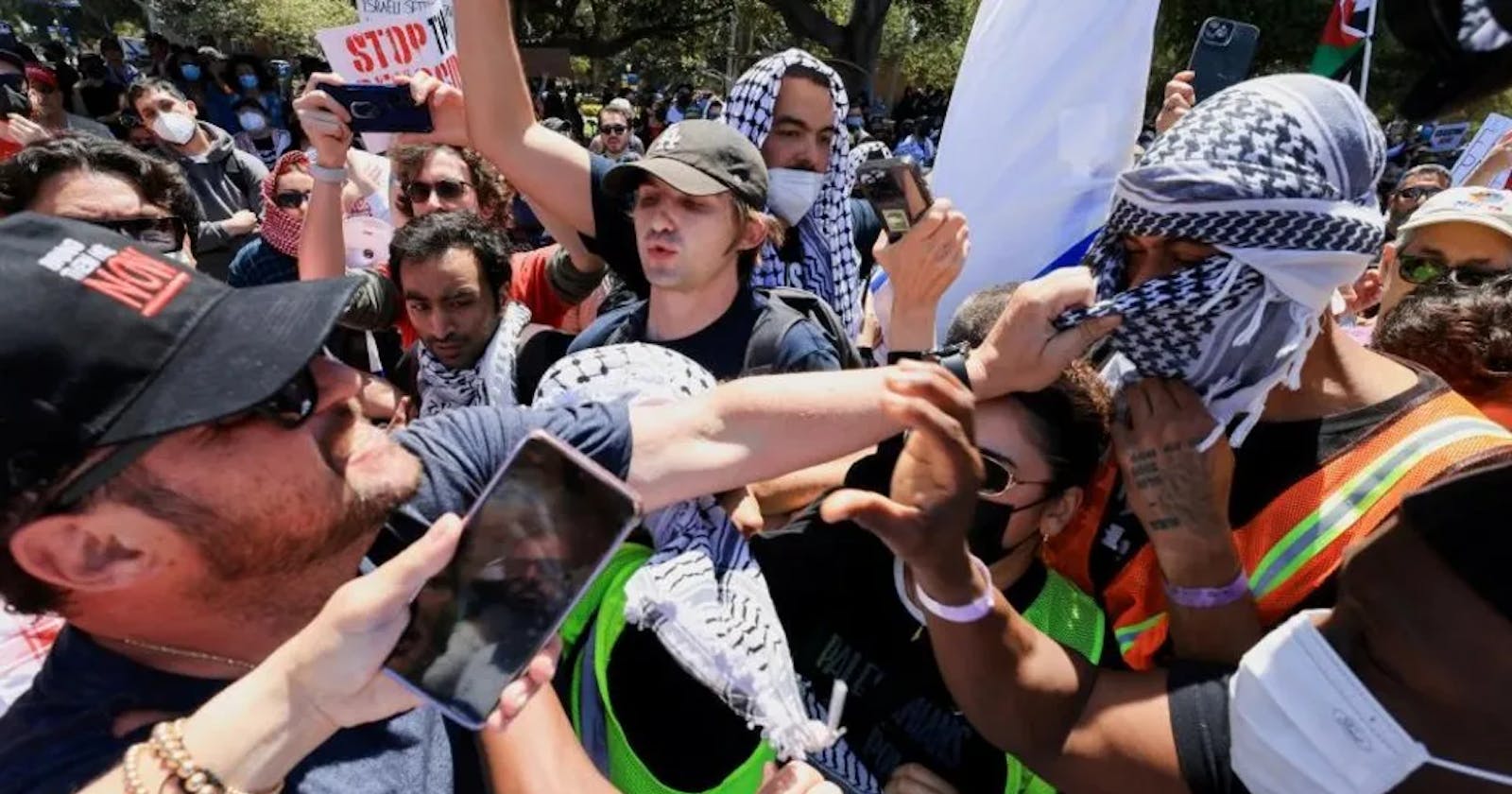 US campus protests: Rival Gaza protest groups clash at UCLA