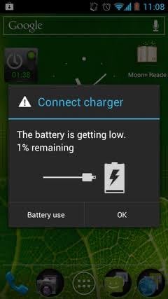 "Samsung phone with low battery indicator"