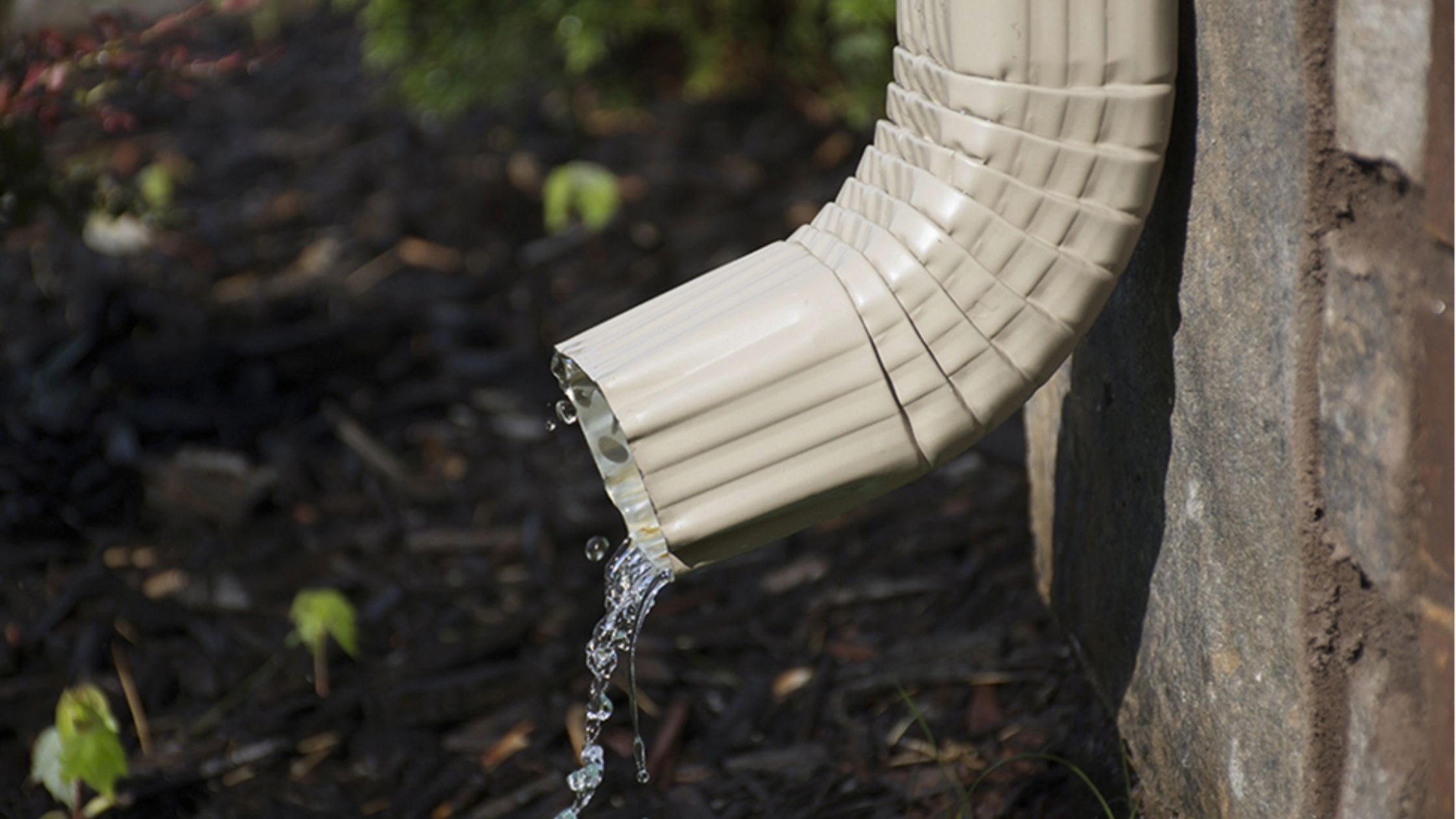 The Role of Downspout Drains in Preventing Erosion