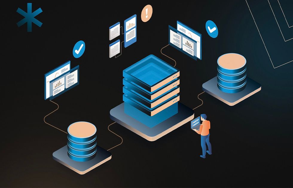 A person examines a screen displaying data next to a central server connected to two databases, represented by blue and orange stack-like structures. The connections between the elements are depicted with lines, and various data charts and check marks are shown on screens.