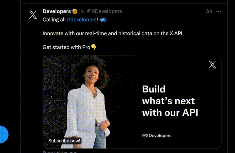 Twitter advertisement by XDevelopers. Text reads: "Calling all #developers! Innovate with our real-time and historical data on the X API. Get started with Pro👇". Image shows a person in a white shirt with text "Build what's next with our API @XDevelopers" and "Subscribe now!" Used by permission. From twitter.com.