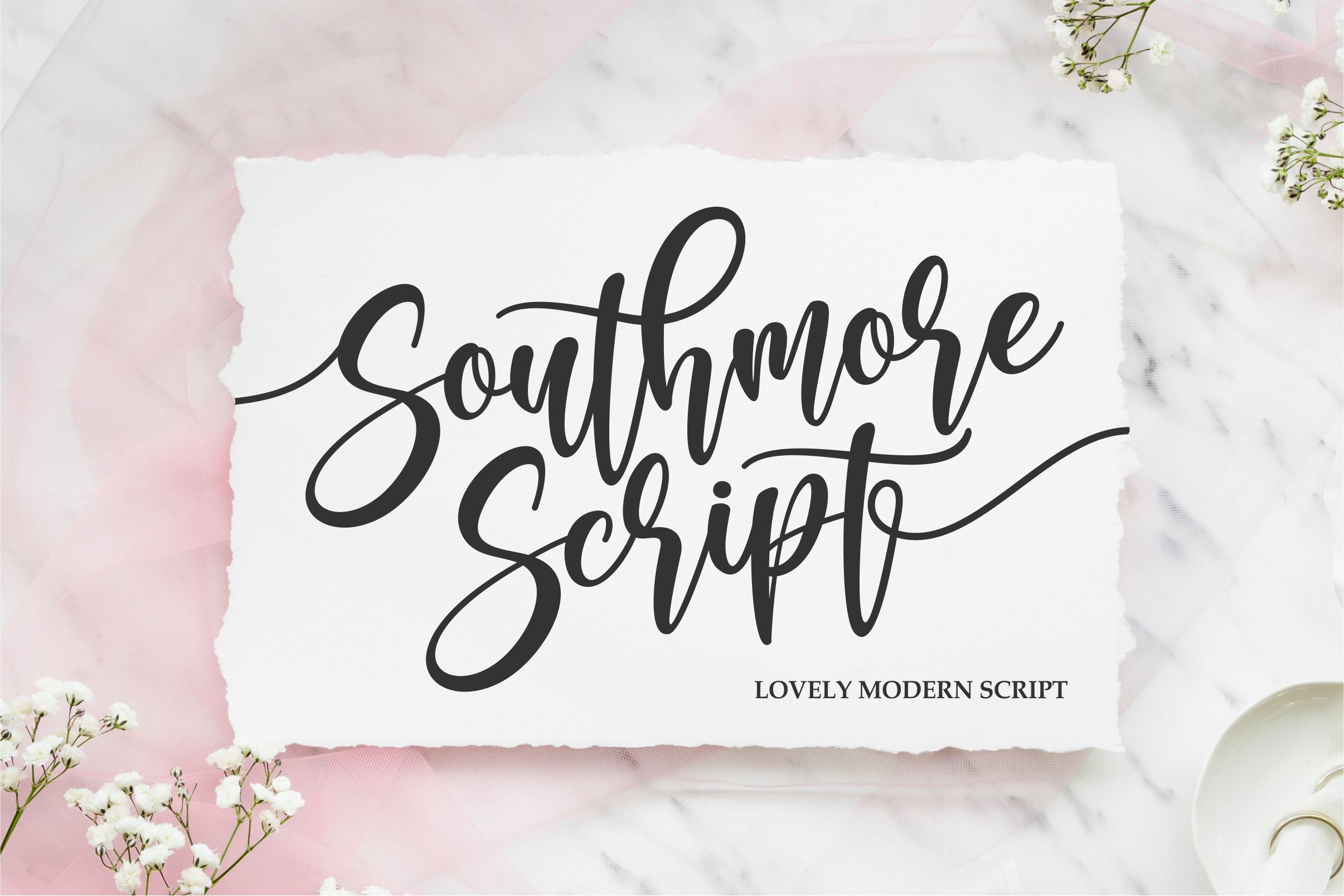 Elevate Designs with Southmore: Cursive Handwritten Font