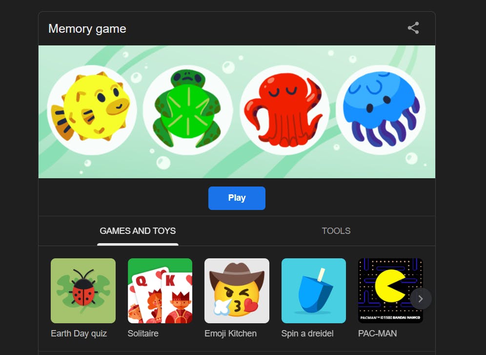 A webpage showing a "Memory game" with cartoon sea creatures, including a fish, turtle, octopus, and jellyfish. Below, other game options like "Earth Day quiz," "Solitaire," "Emoji Kitchen," "Spin a dreidel," and "PAC-MAN" are displayed.