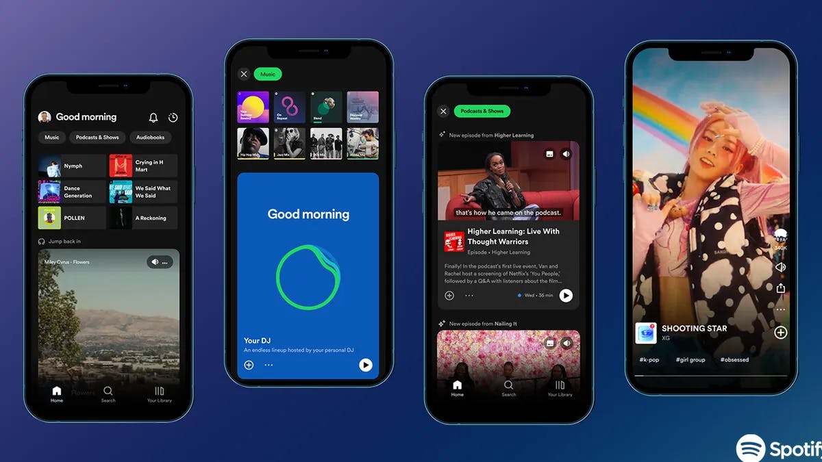 A display of four smartphones showcasing different screens from a music streaming app, featuring playlists, podcasts, and a video. A blue background and the app's logo is partially visible at the bottom right.