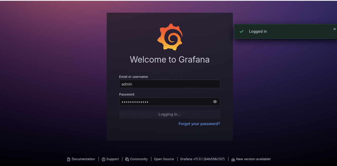 Grafana login screen displaying input fields for email/username and password with a notification indicating a successful login.