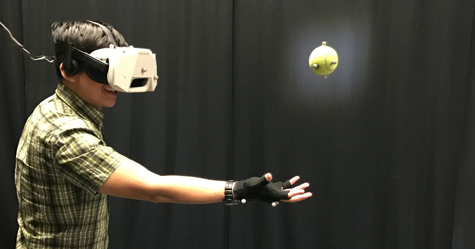 Watch this guy catch a real ball in VR