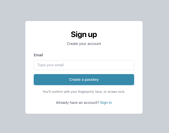 Sign up page with an email field and a "Create a passkey" button