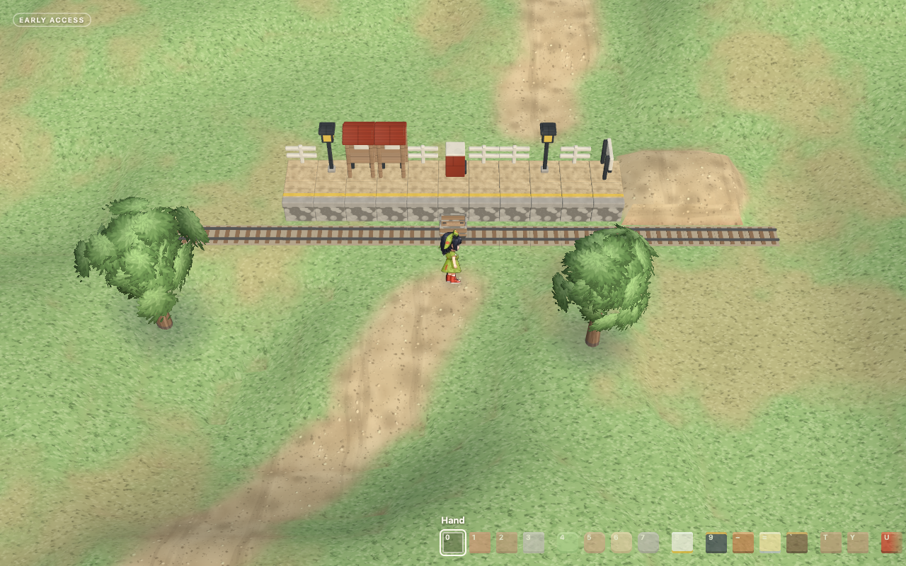 A carved station beside the rails