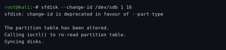 sfdisk --change-id command reassigning a partition's type to 16, confirming the partition table was altered