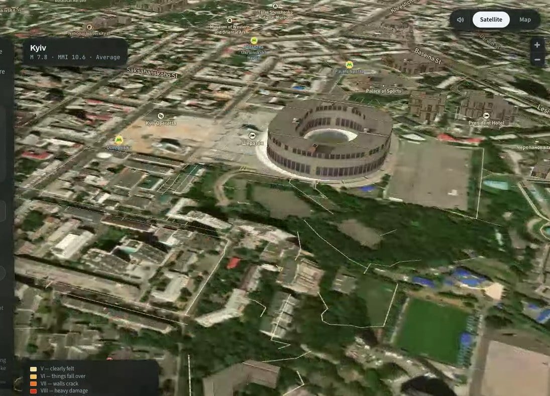 Pitched view of central Kyiv before the shaking starts. Thousands of buildings are extruded from the map's vector tiles with window-pattern textures on their walls; a 3D model of the Olympic stadium stands in the middle distance.