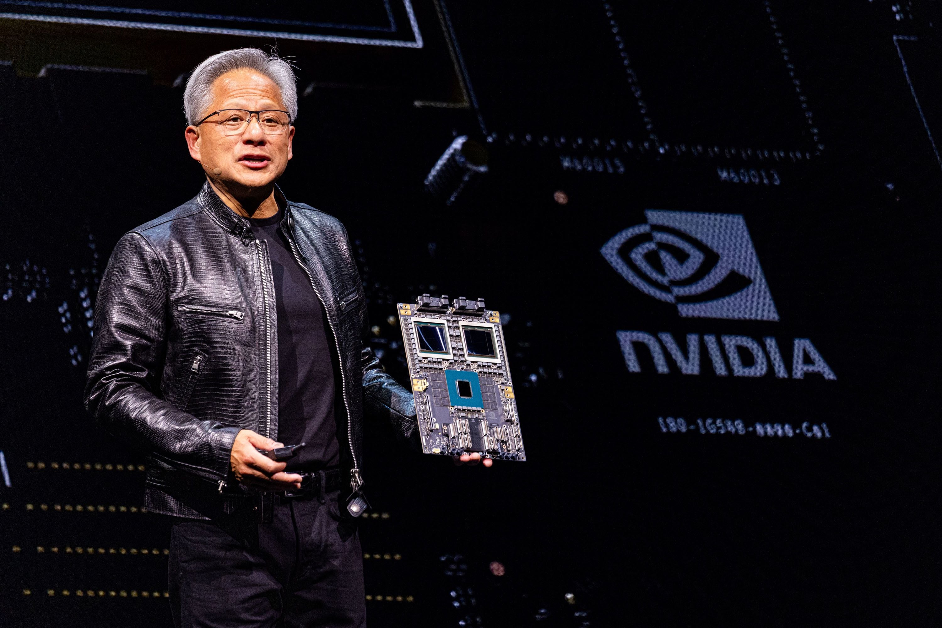 Jensen Huang presenting NVIDIA hardware in Taipei on 2 June 2024; photograph by Annabelle Chih, Bloomberg, via Getty Images.
